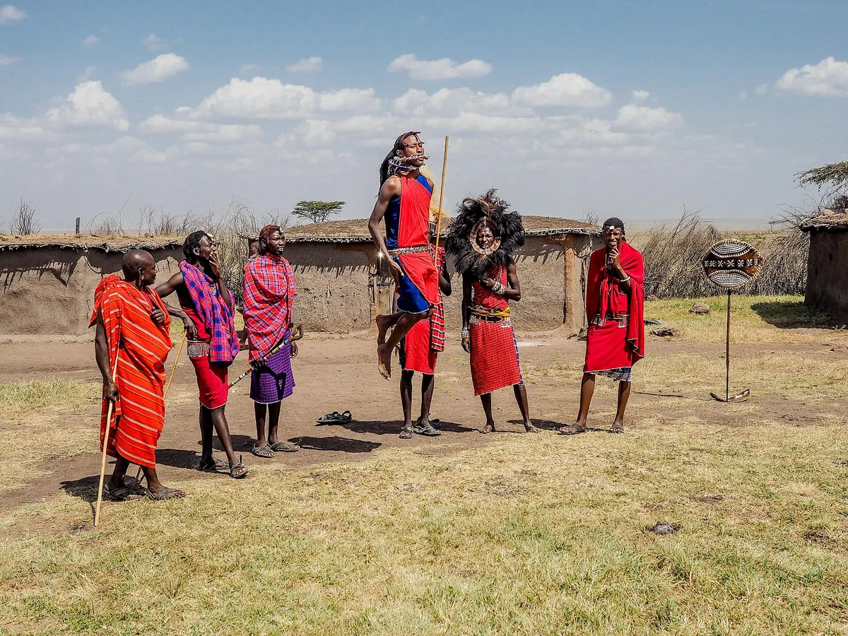 Maasai men performing the adumu jumping dance in Kenya
